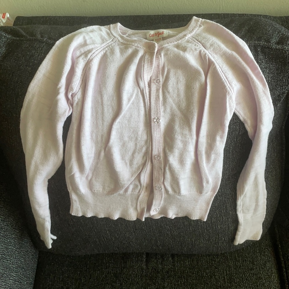 Light lavender/pink button down sweater.